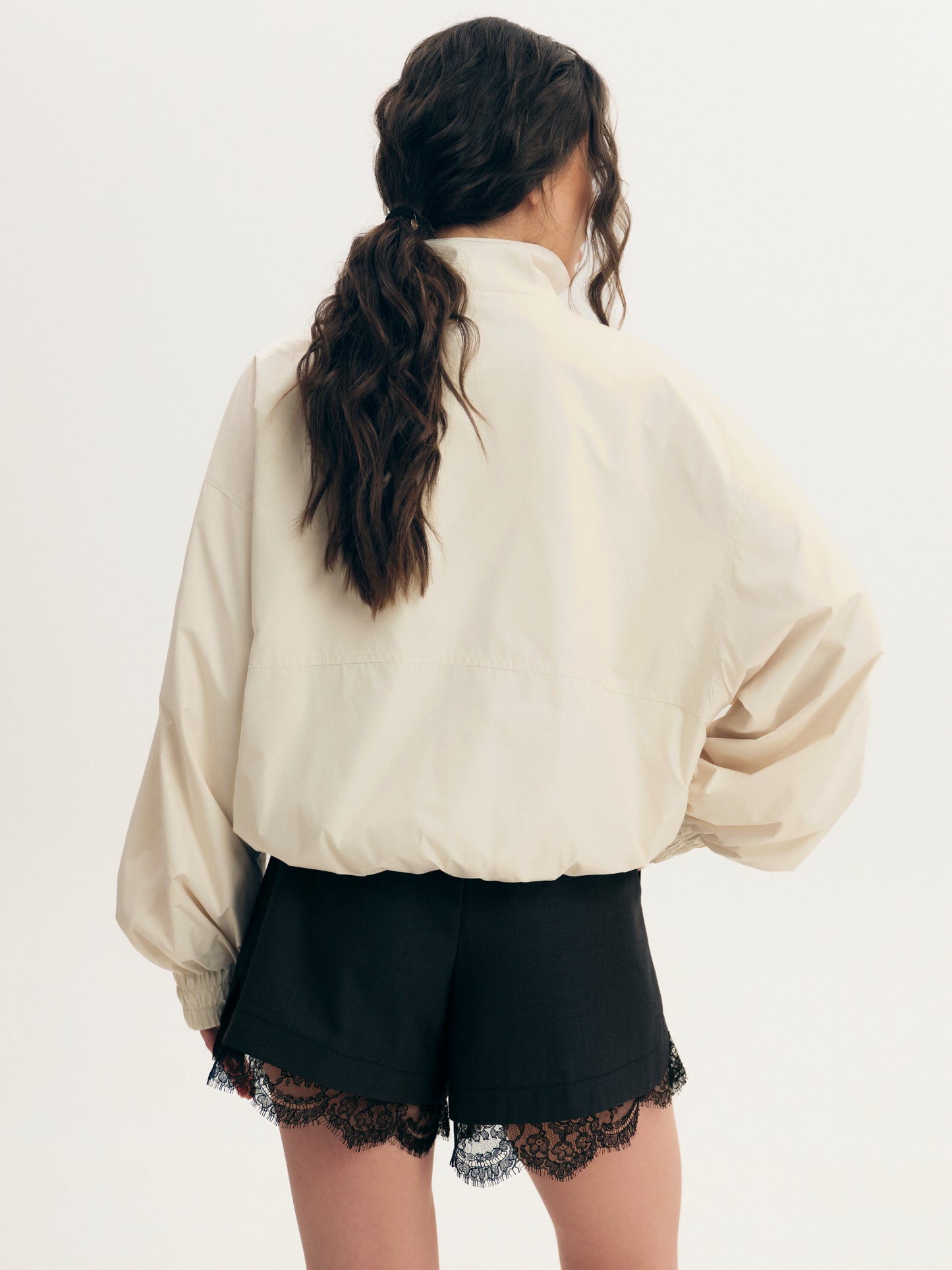 Lightweight high neck jacket in white-off nylon