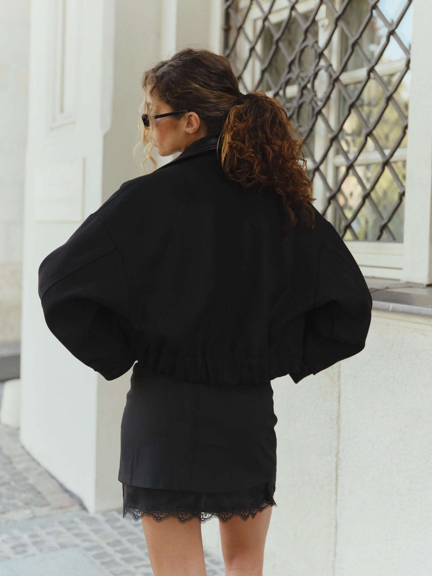 Cropped zipped bomber jacket with accent leather collar and pocket detail