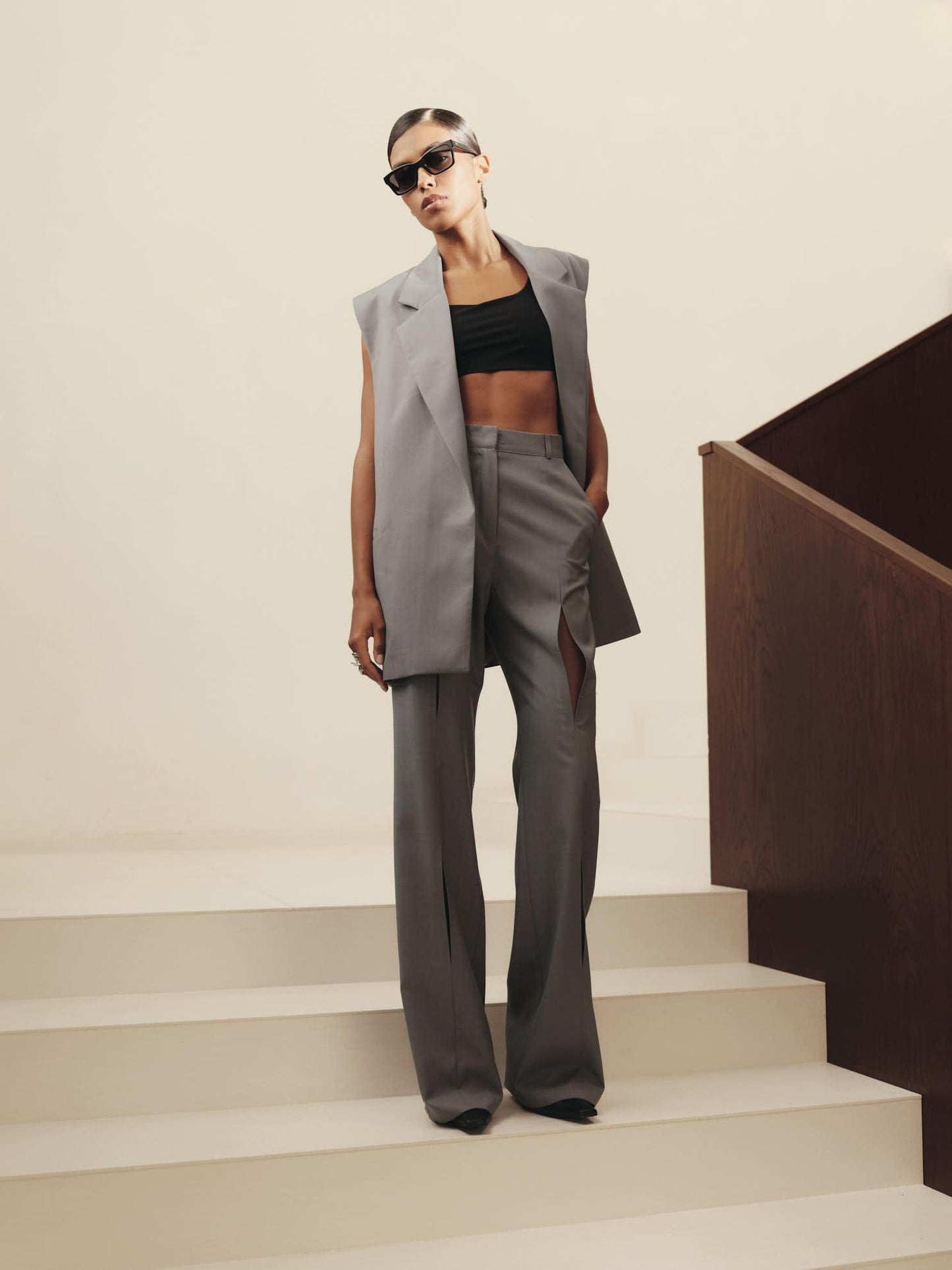 Two-piece virgin wool contemporary fit set with accent cut-out sleeveless jacket and pants