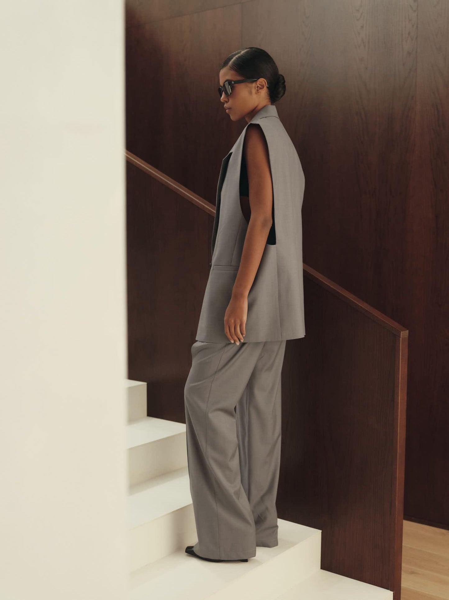 Two-piece virgin wool contemporary fit set with accent cut-out sleeveless jacket and pants