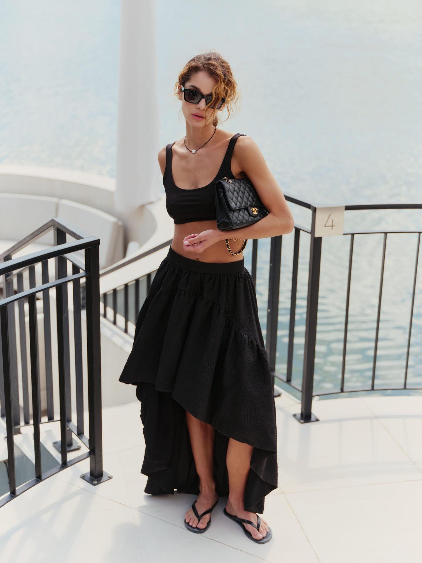 The Drama asymmetric skirt in black crinkle silk