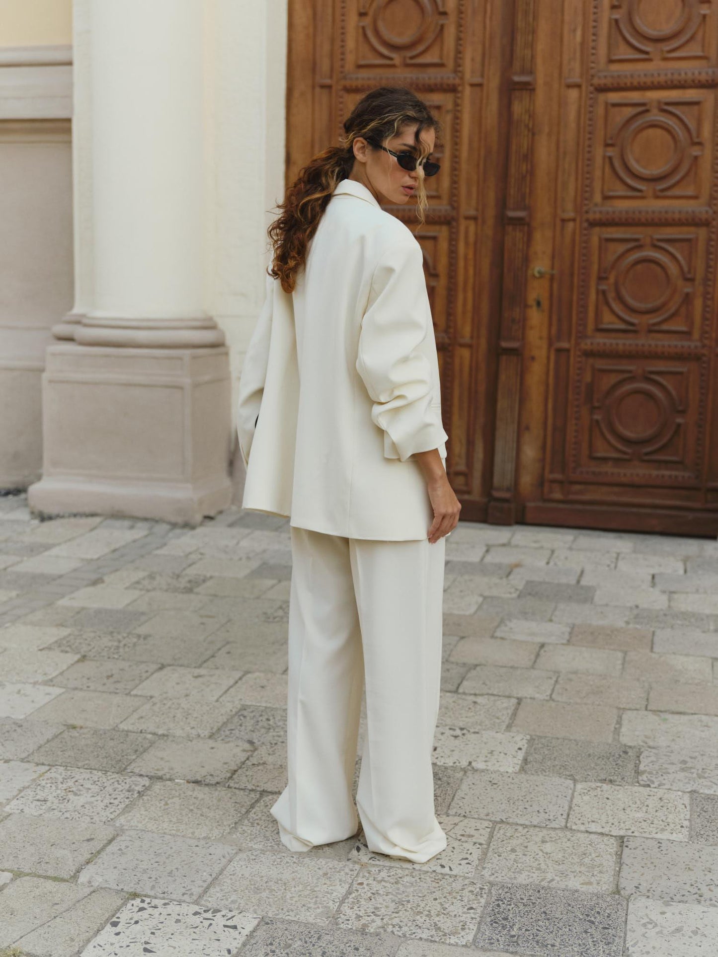 Two-piece relaxed fit suit with palazzo pants in cream wool