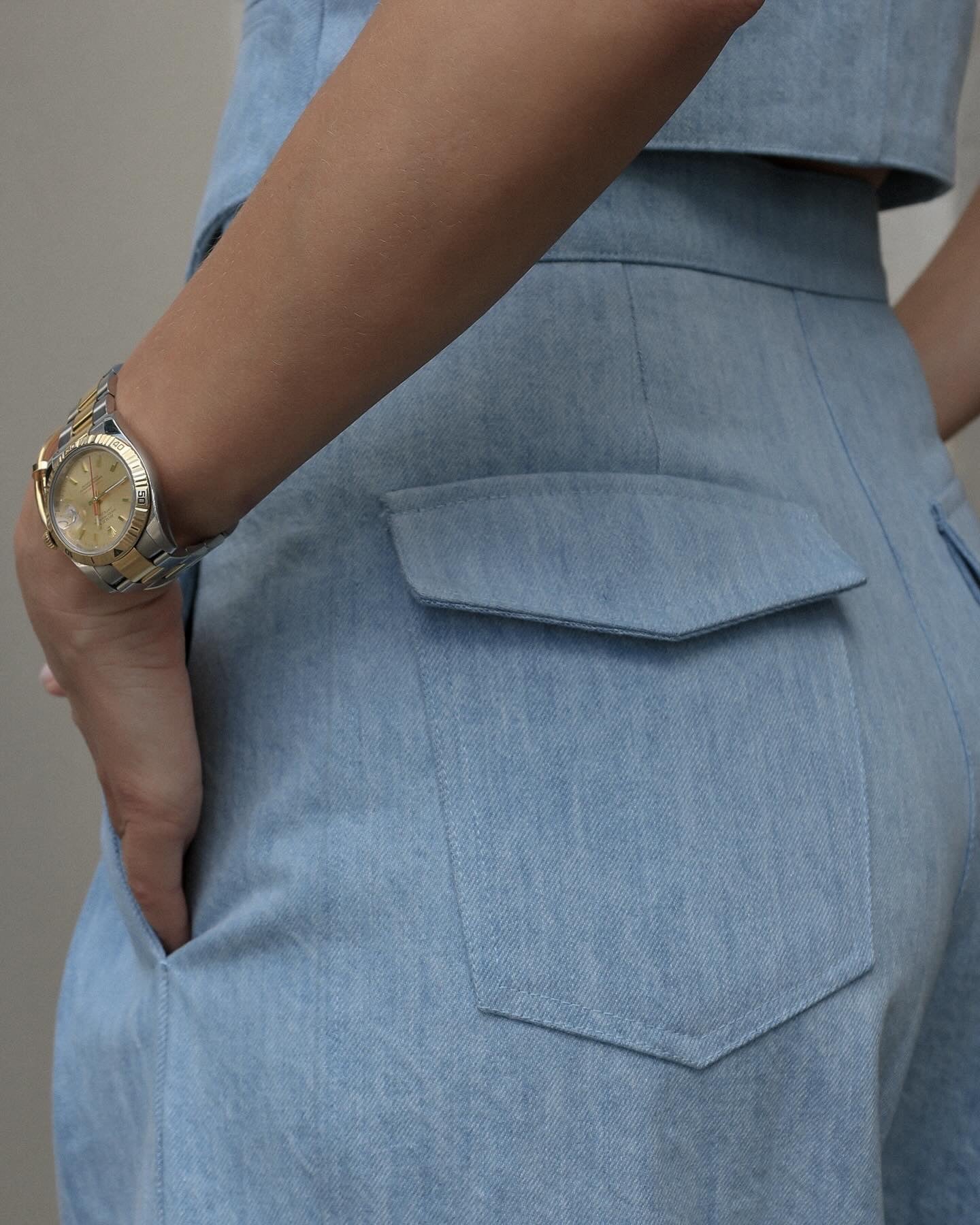Two-piece denim set with palazzo pants and crop buttoned vest