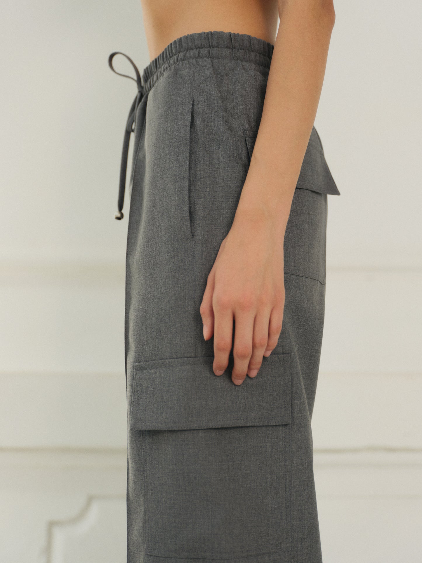 Yasmine stitched-in crease wool pants with cargo pockets