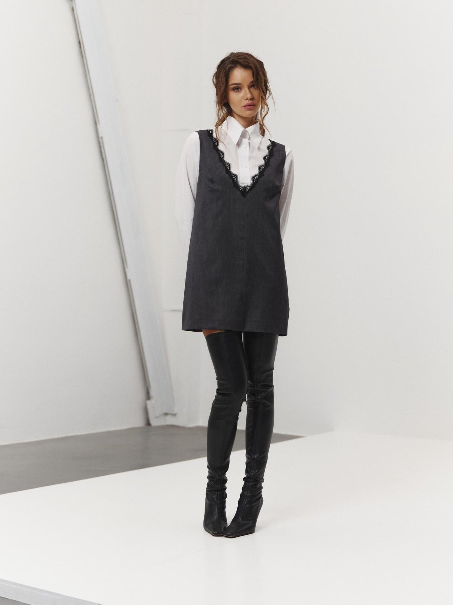 Loose fit mini dress with accent lace v-neck