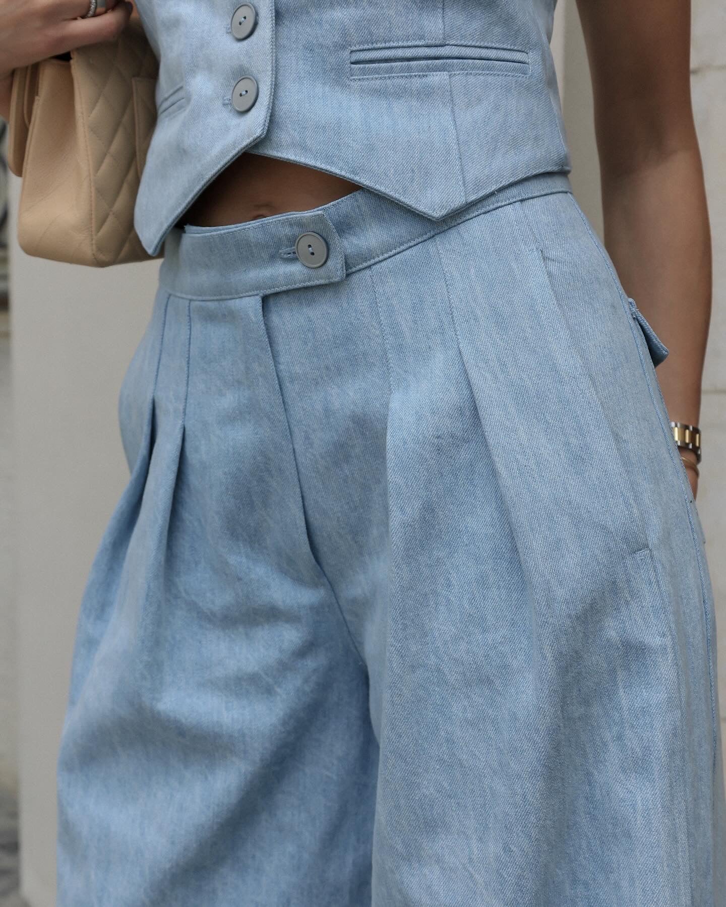 Two-piece denim set with palazzo pants and crop buttoned vest