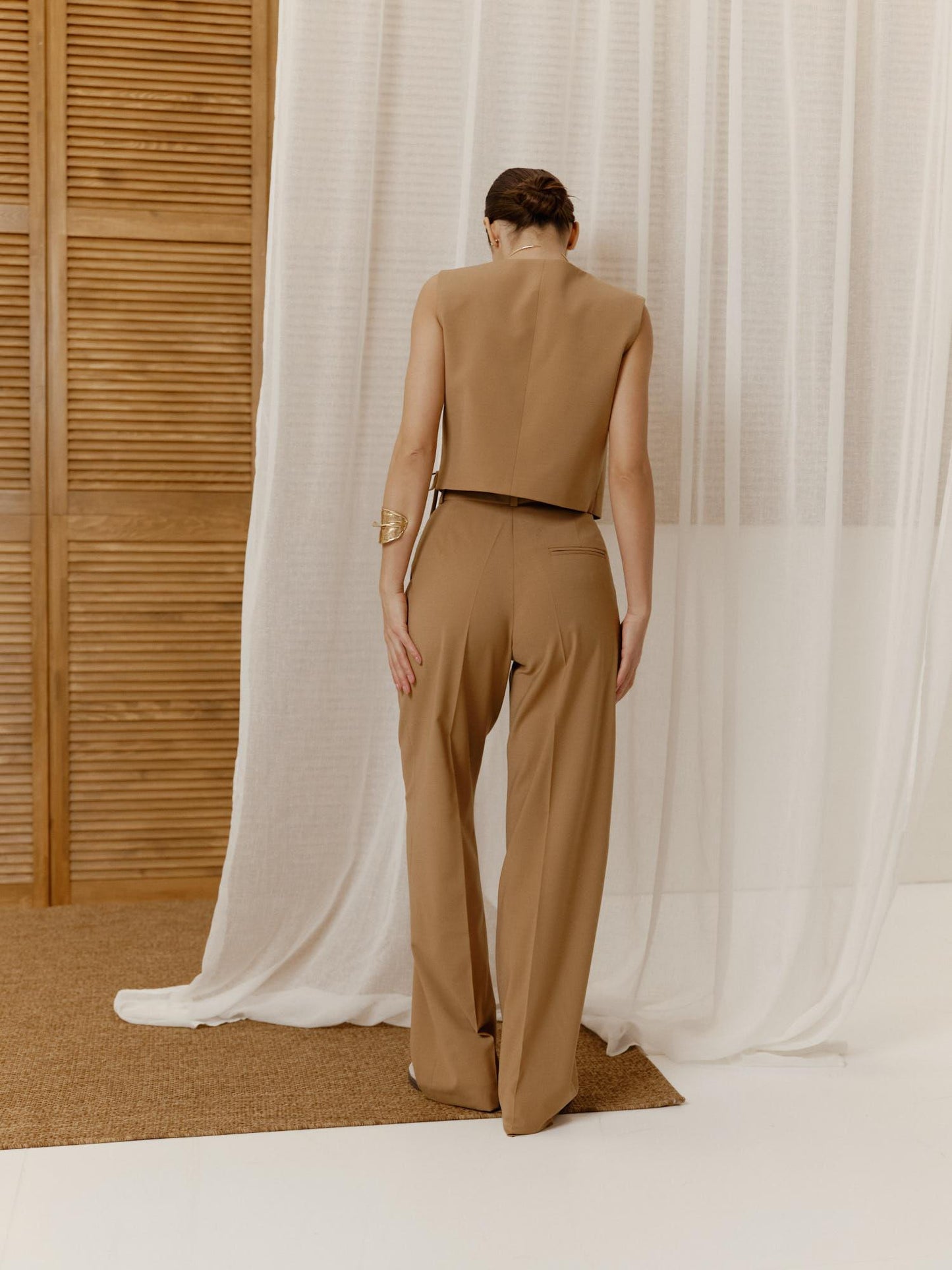 Two-piece wool suit with vest