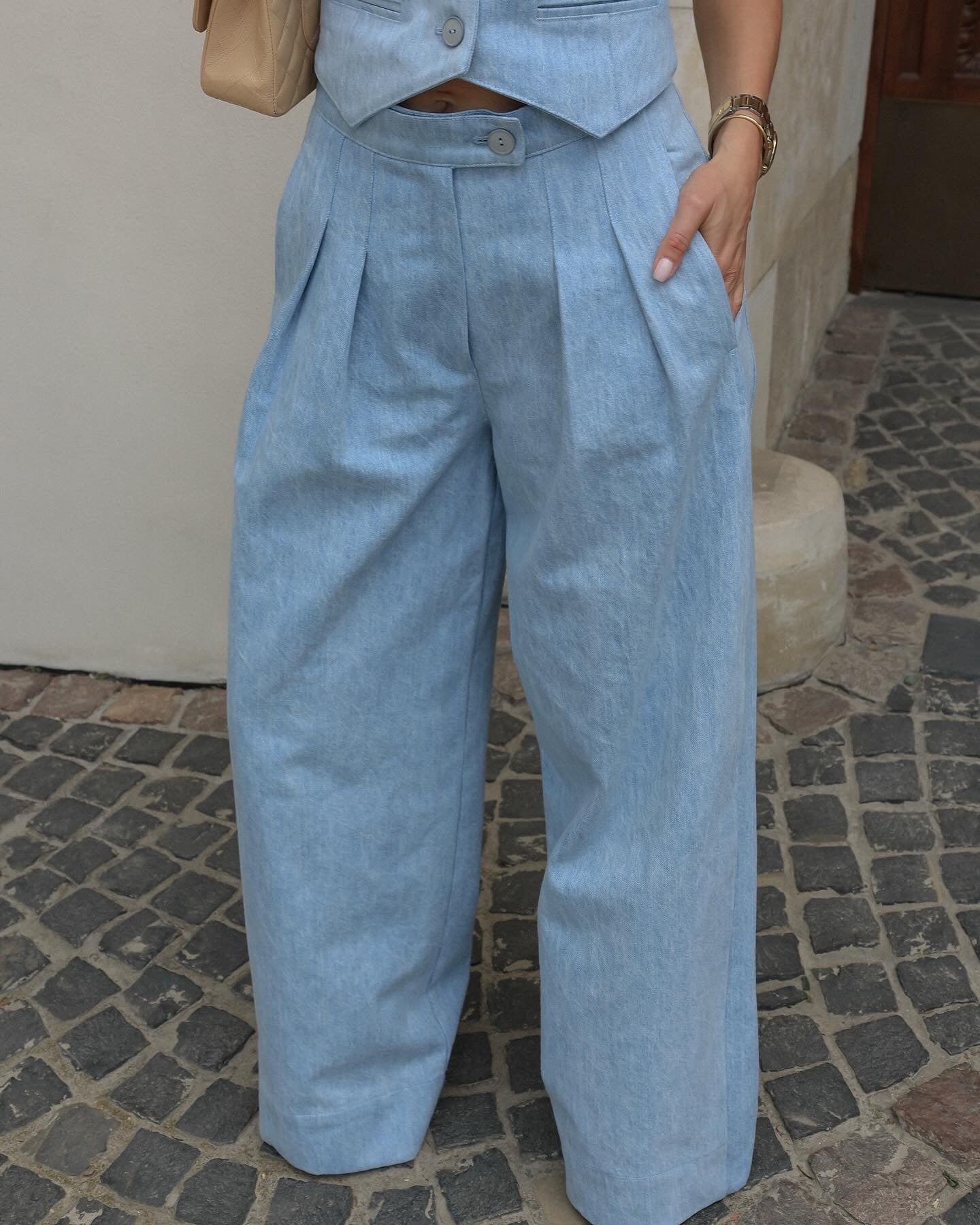Two-piece denim set with palazzo pants and crop buttoned vest