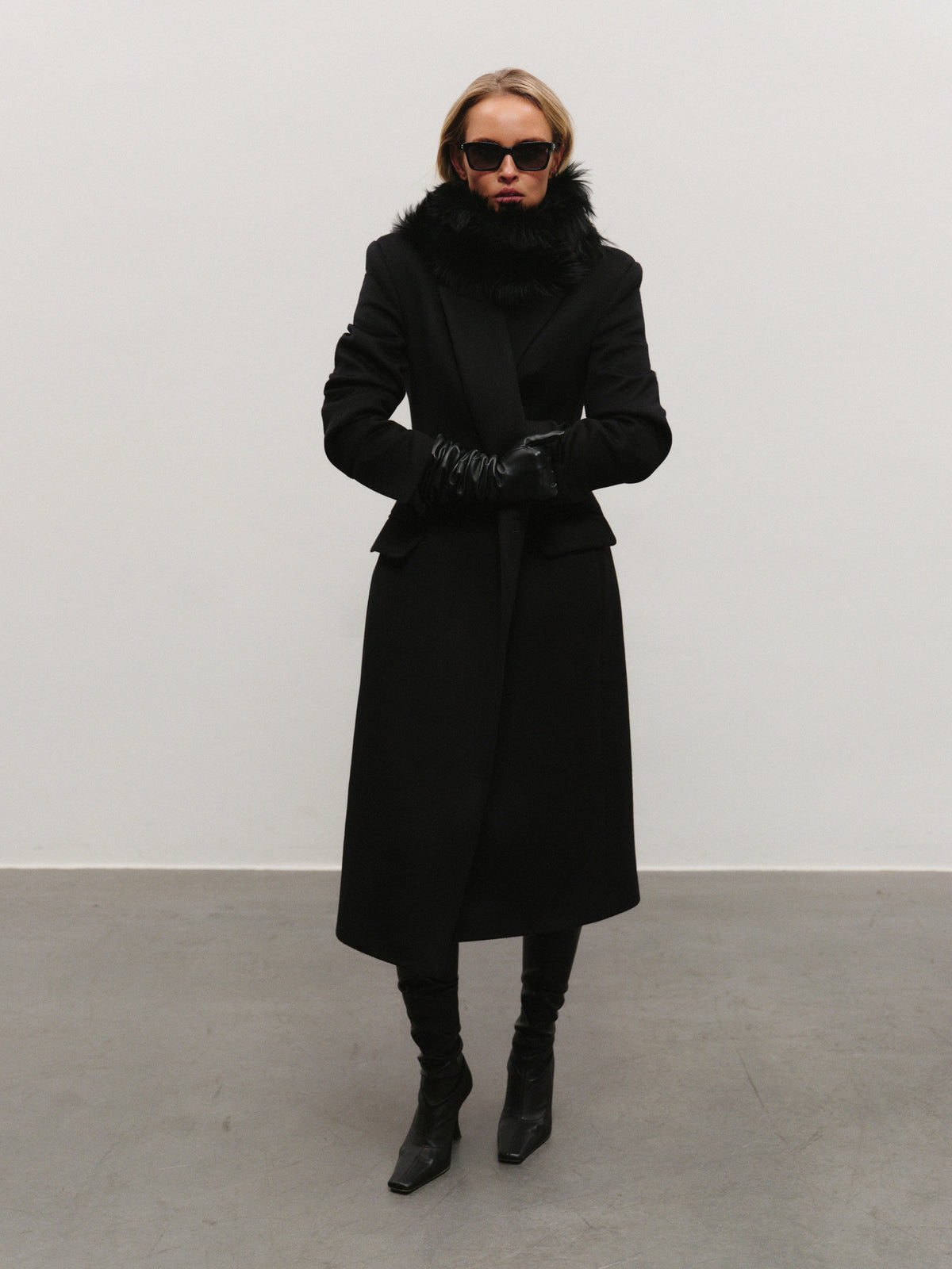 Elen slim fit mid-length coat in premium black wool with convertible collar and additional fur accessory
