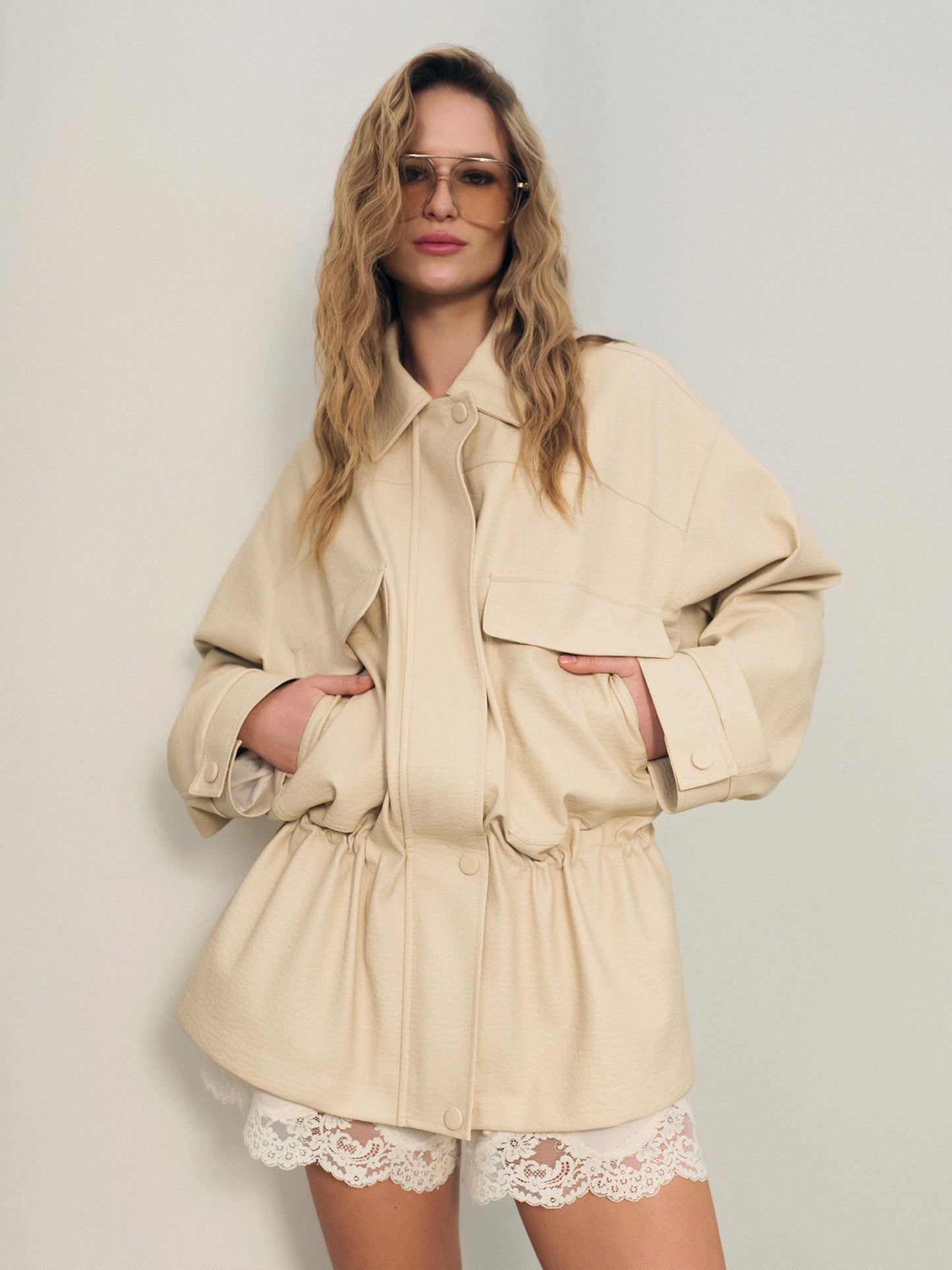 Trending low-waist utility jacket in vanilla beige eco leather