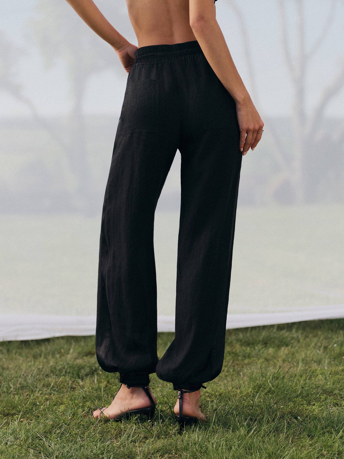 Yasmine stitched-in creases linen jogger-pants