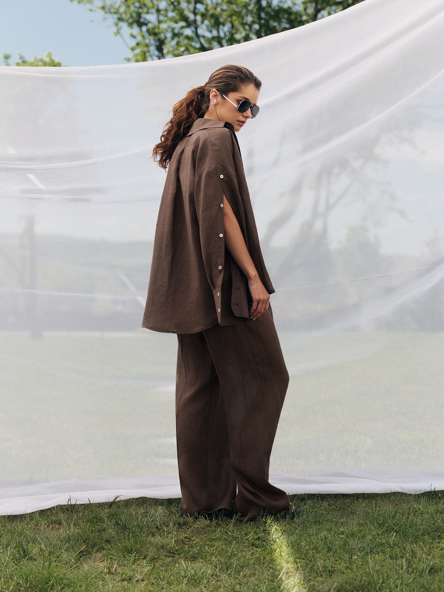 Oversized shirt with accent buttoned sleeves with wide-leg pants in tobacco silk linen