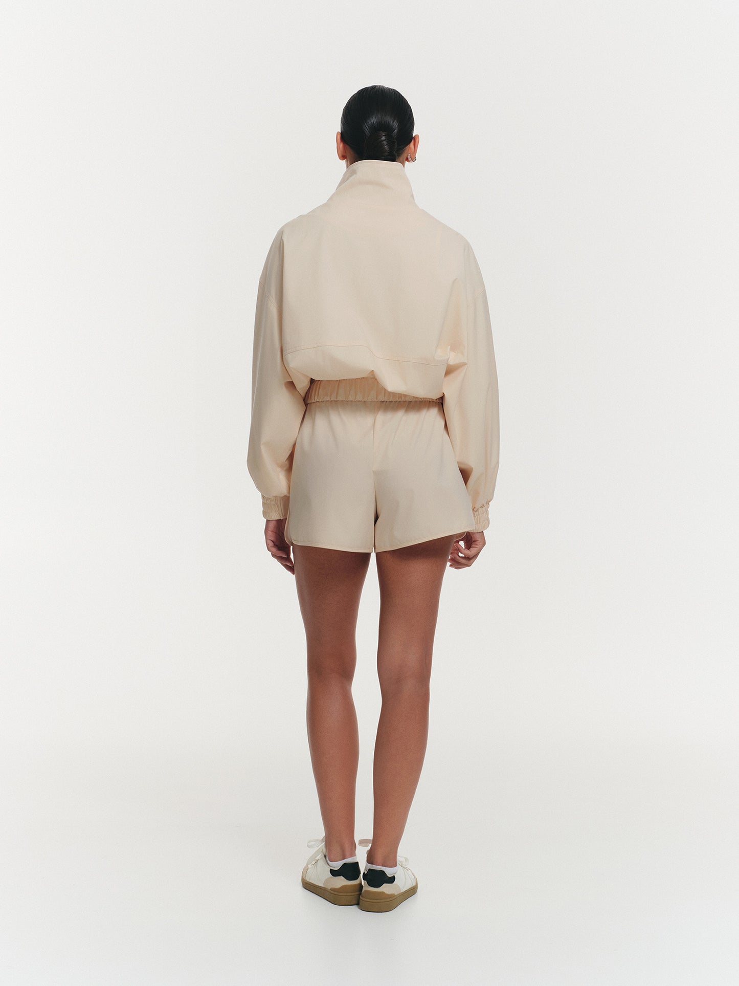 Lightweight high neck jacket in blush peach