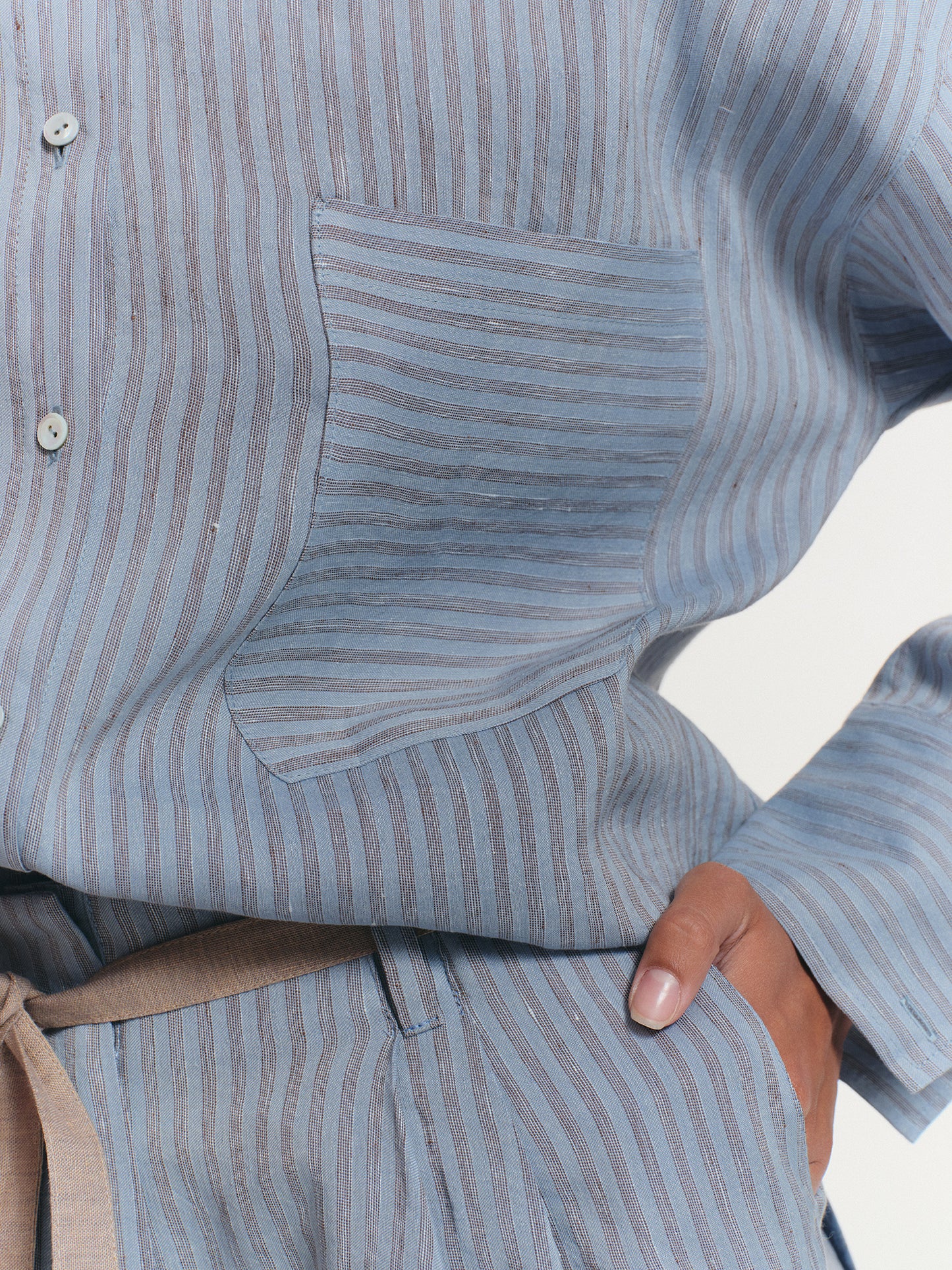 Two-piece linen set with relaxed fit shirt and shorts