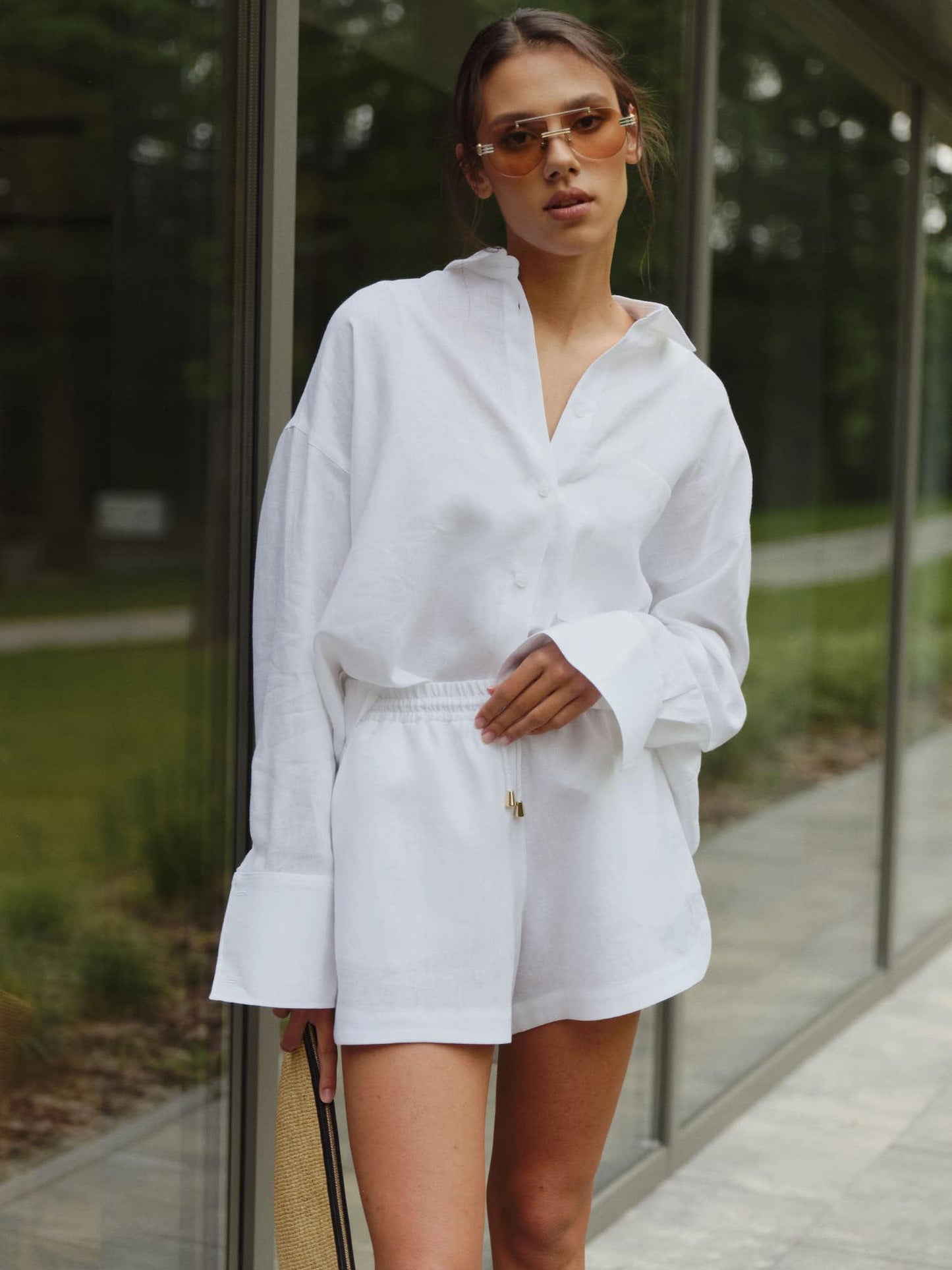 Oversized shirt with accent buttoned back in white linen