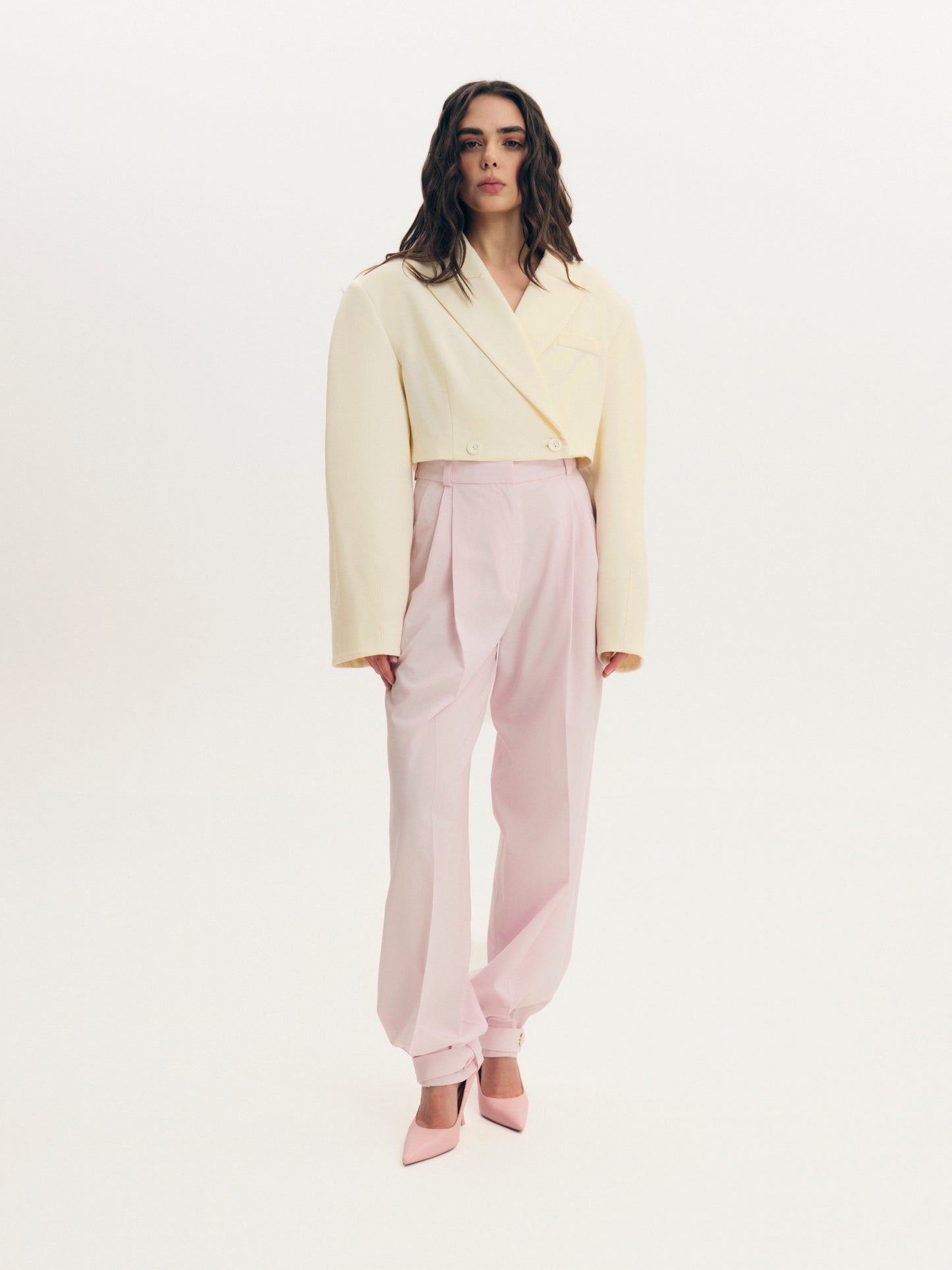 Wide-leg statement color wool pants with accent convertible hem