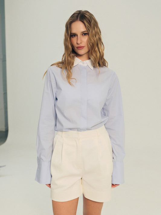 Regular fit shirt with accented white collar and buttoned cuffs in ice blue cotton
