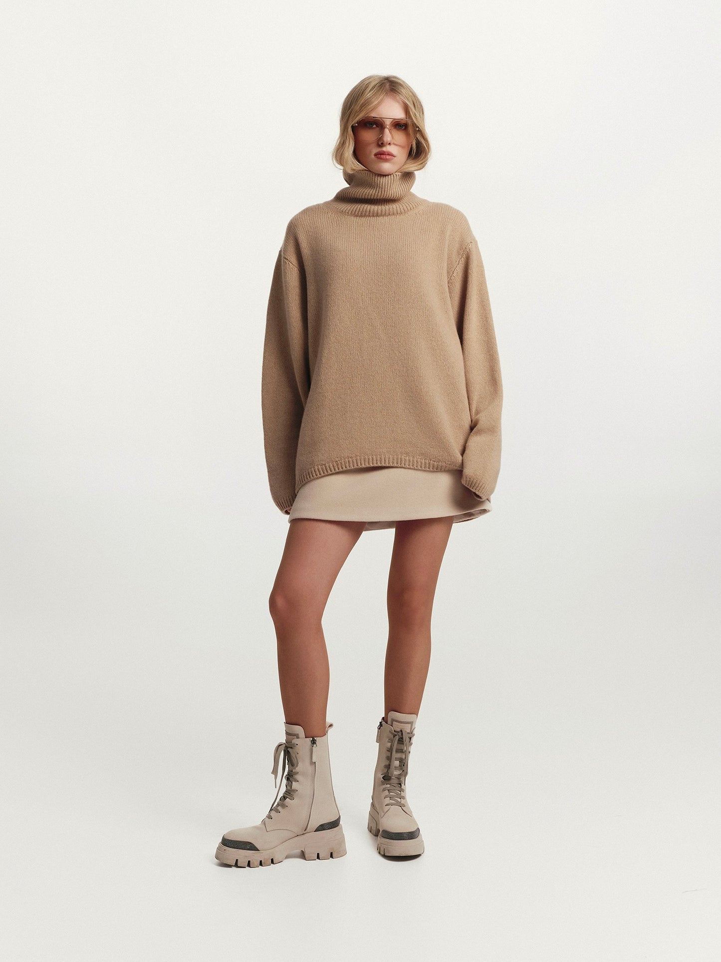 High-rise neckline oversized cashmere sweater in warm beige