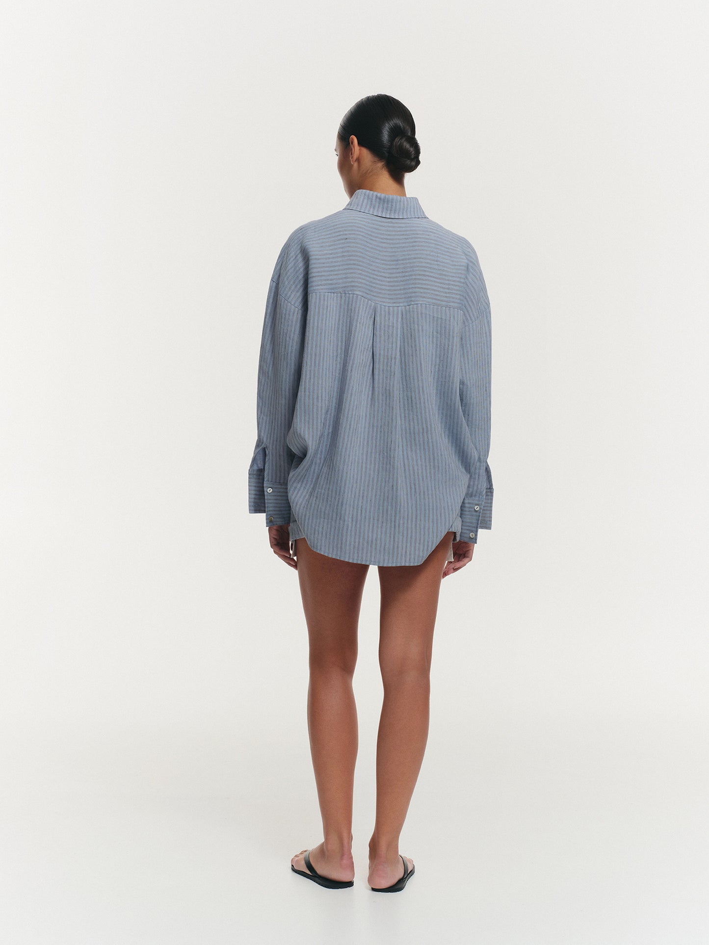 Two-piece linen set with relaxed fit shirt and shorts