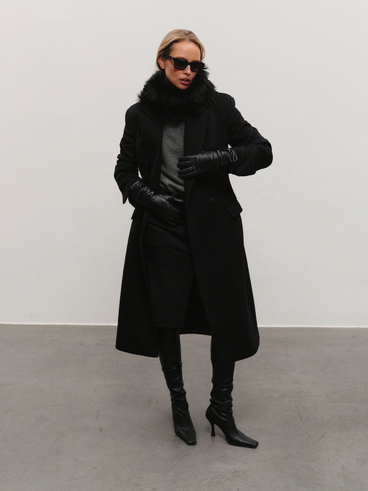 Elen slim fit mid-length coat in premium black wool with convertible collar and additional fur accessory