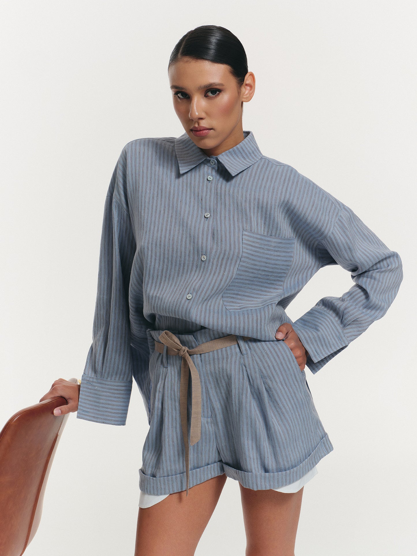 Two-piece linen set with relaxed fit shirt and shorts