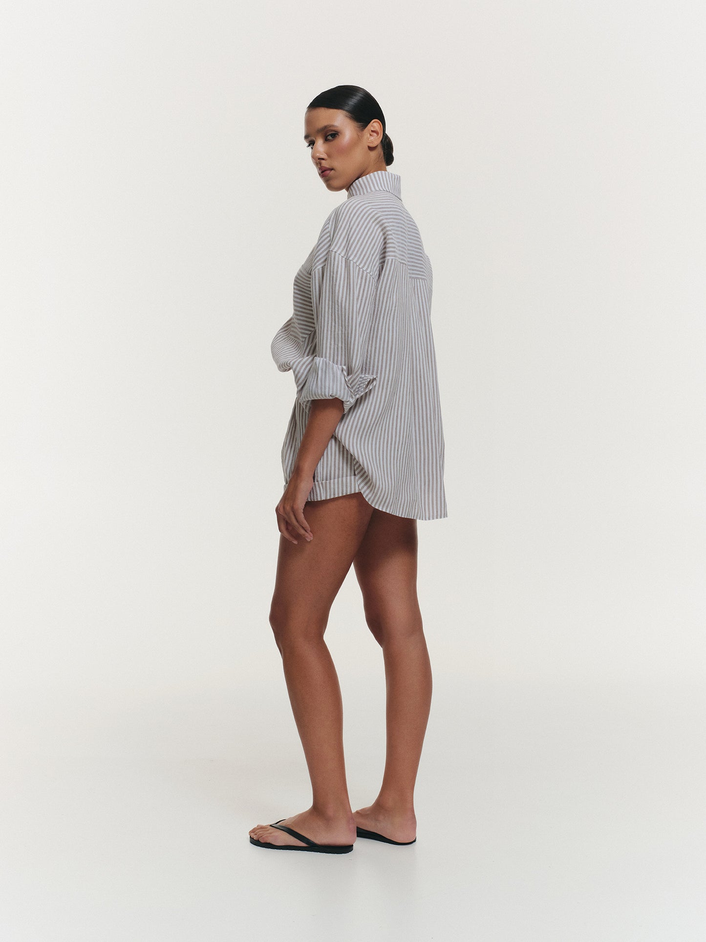 Two-piece stripped linen set with relaxed fit shirt and shorts