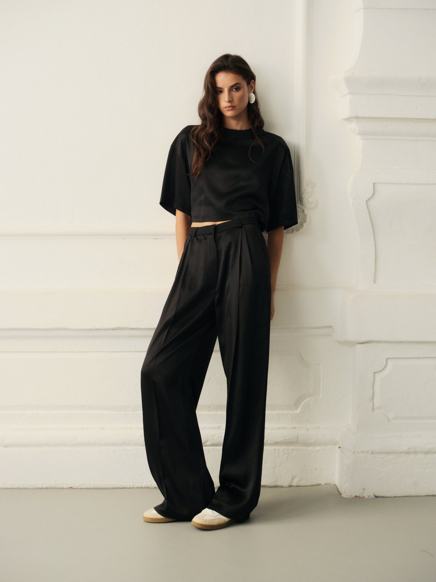 Wide leg pants and oversized crop top in fine black wool with contrast satin front