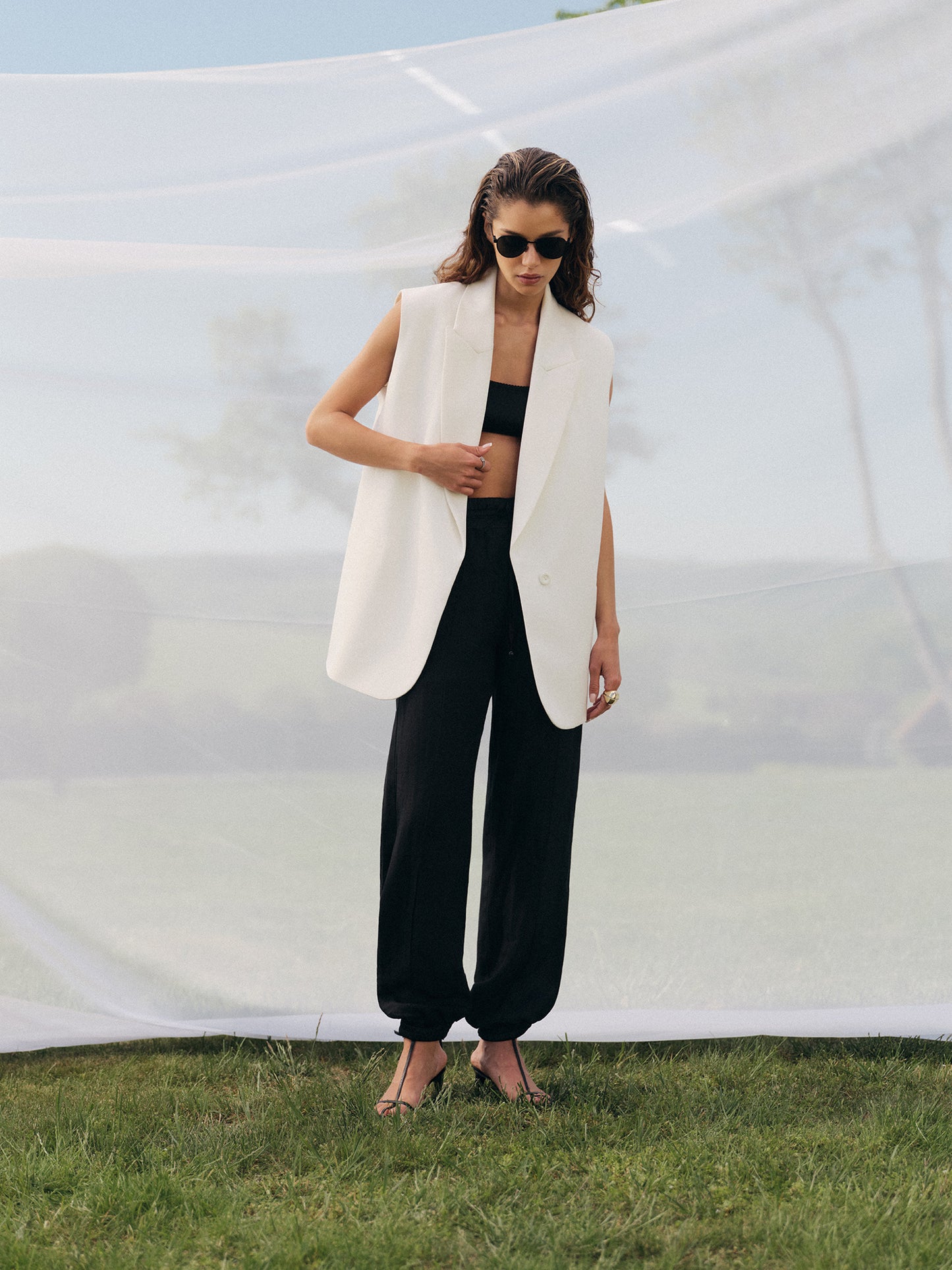 Loose fit sleeveless jacket in milk wool