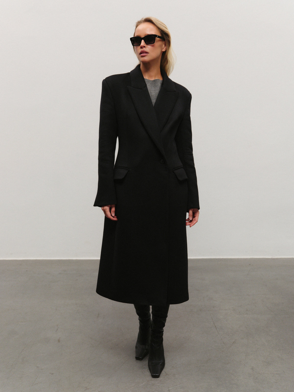 Elen slim fit mid-length coat in premium black wool with convertible collar and additional fur accessory
