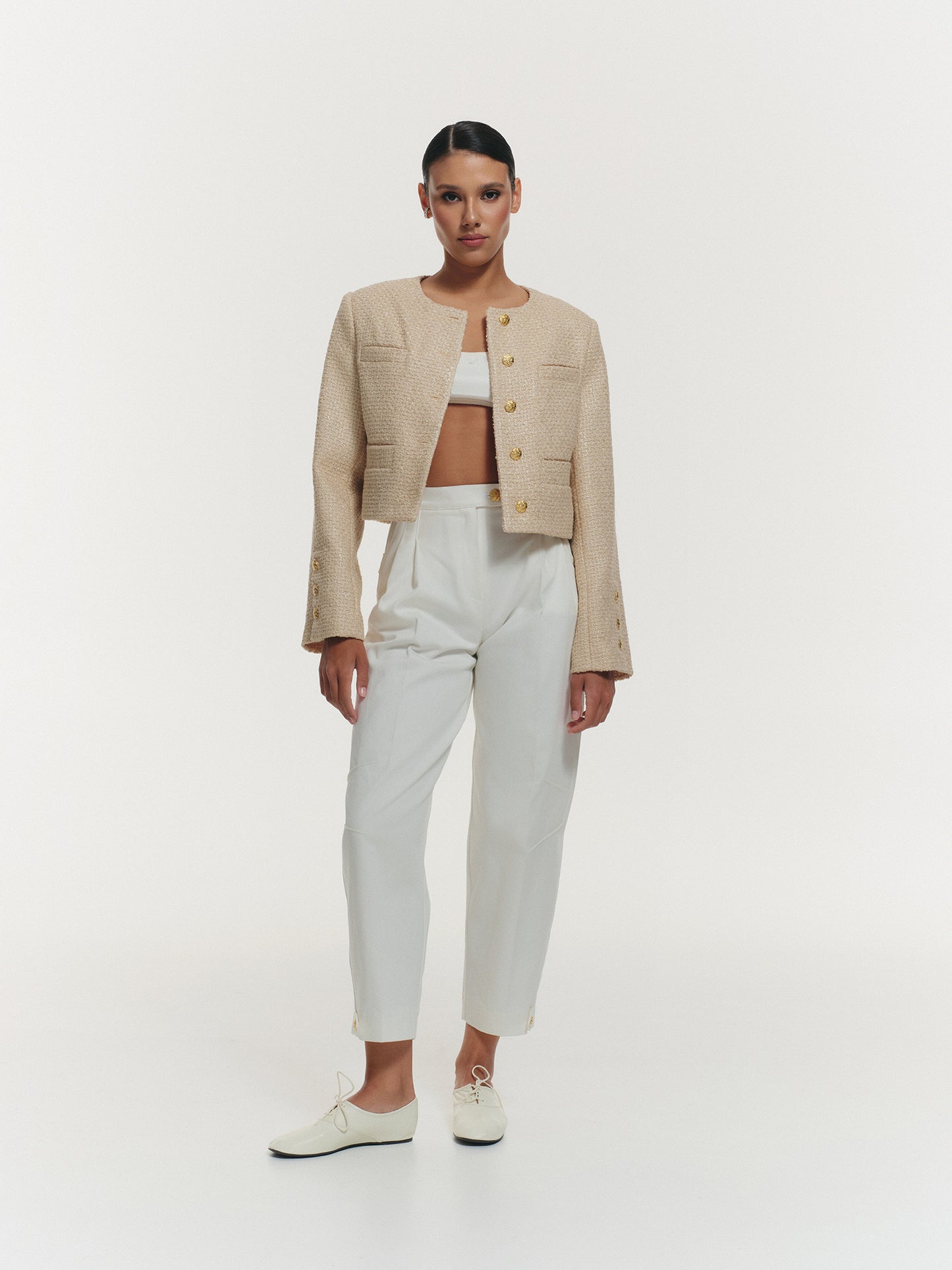 High waist banana pants with accent details in white cotton