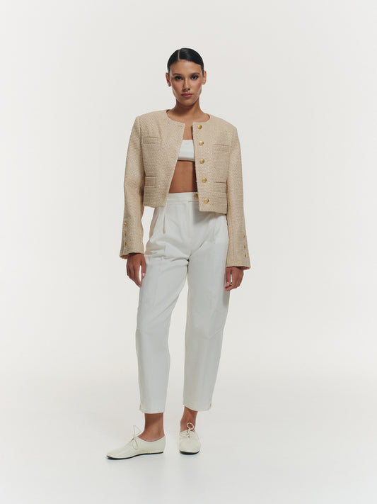 High waist banana pants with accent details in white cotton