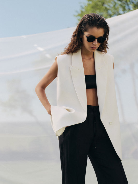Loose fit sleeveless jacket in milk wool