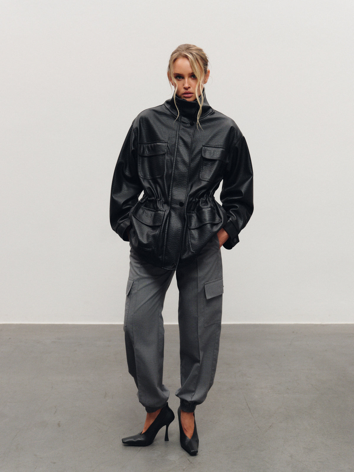 Trending eco-leather utility jacket with high-neck collar