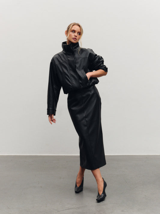 Vegan leather mid-length skirt with back slit