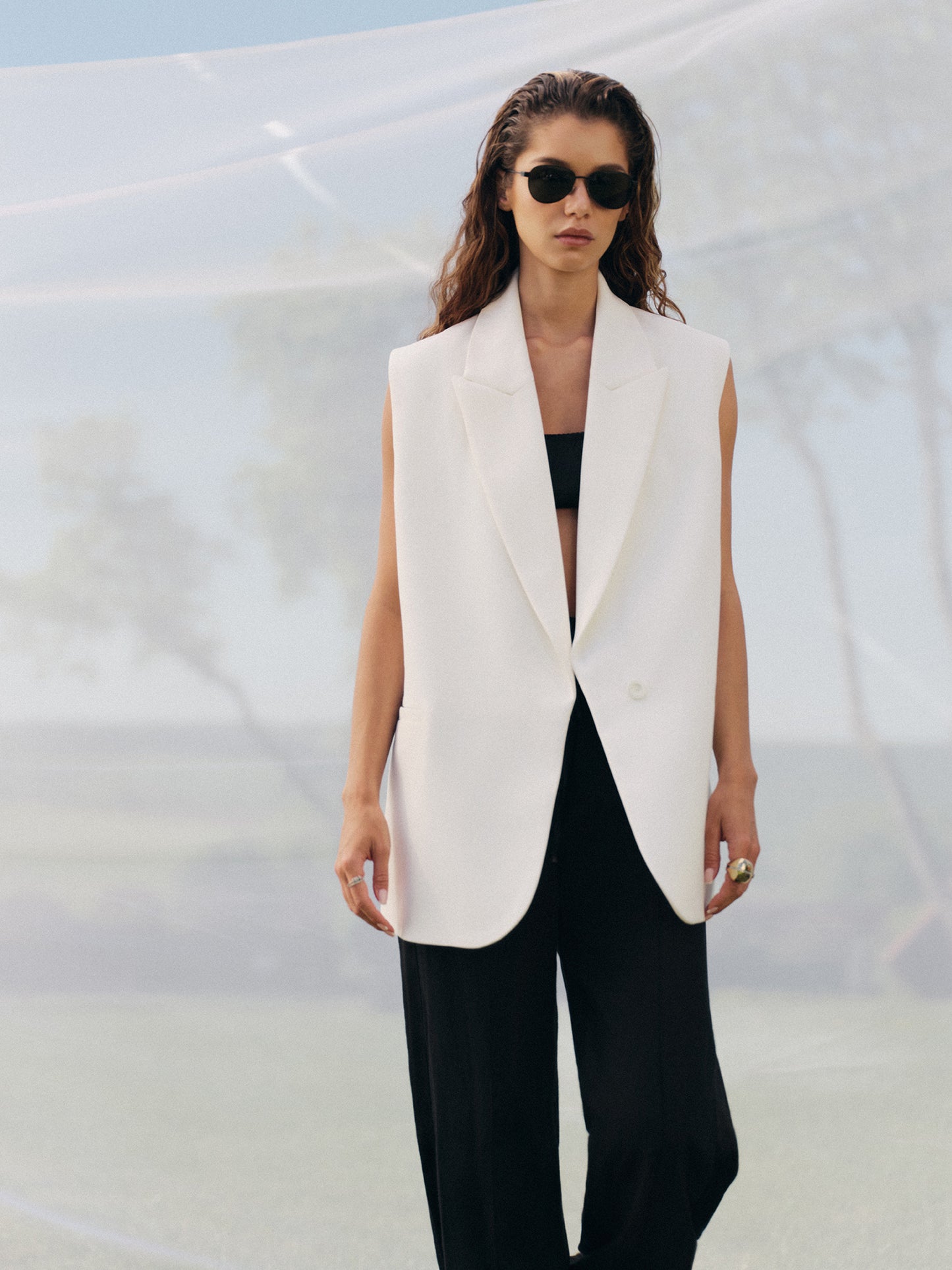 Loose fit sleeveless jacket in milk wool