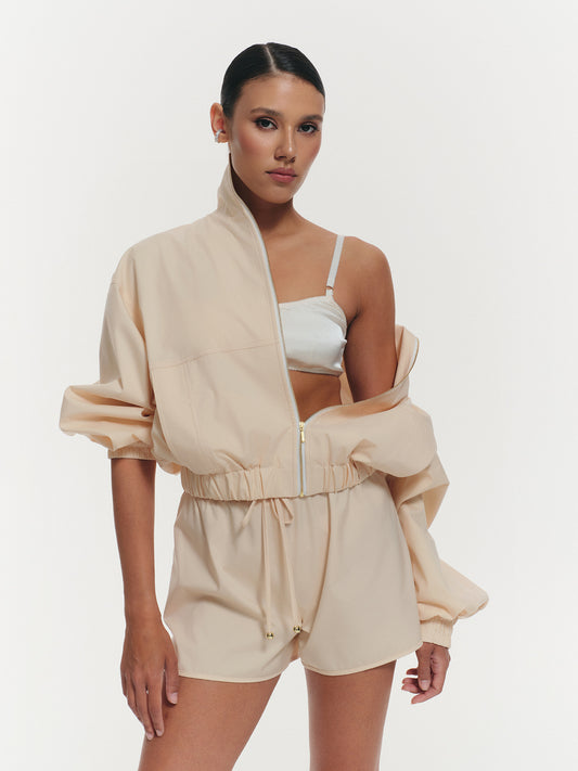Lightweight high neck jacket in blush peach