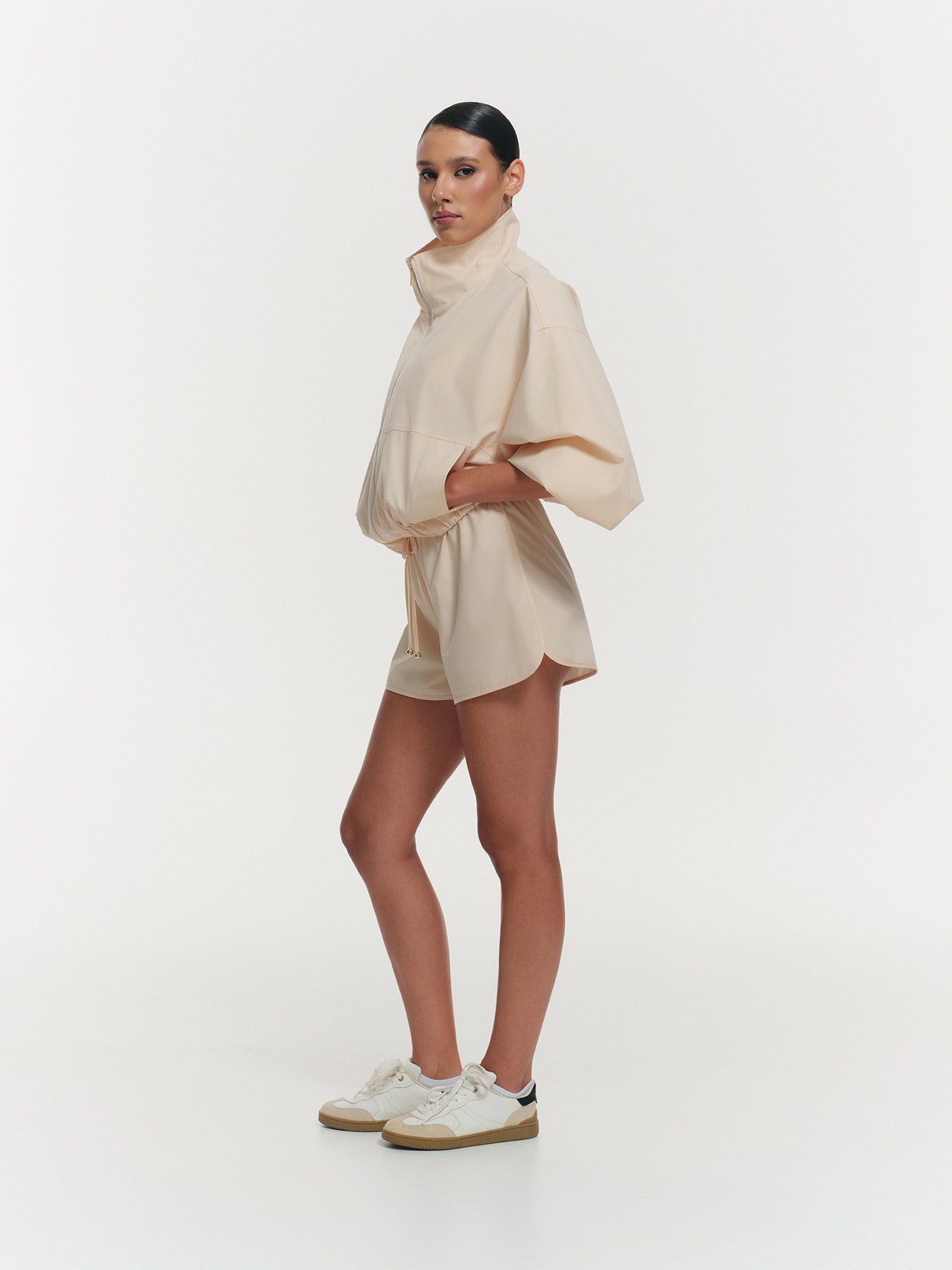 Lightweight high neck jacket in blush peach
