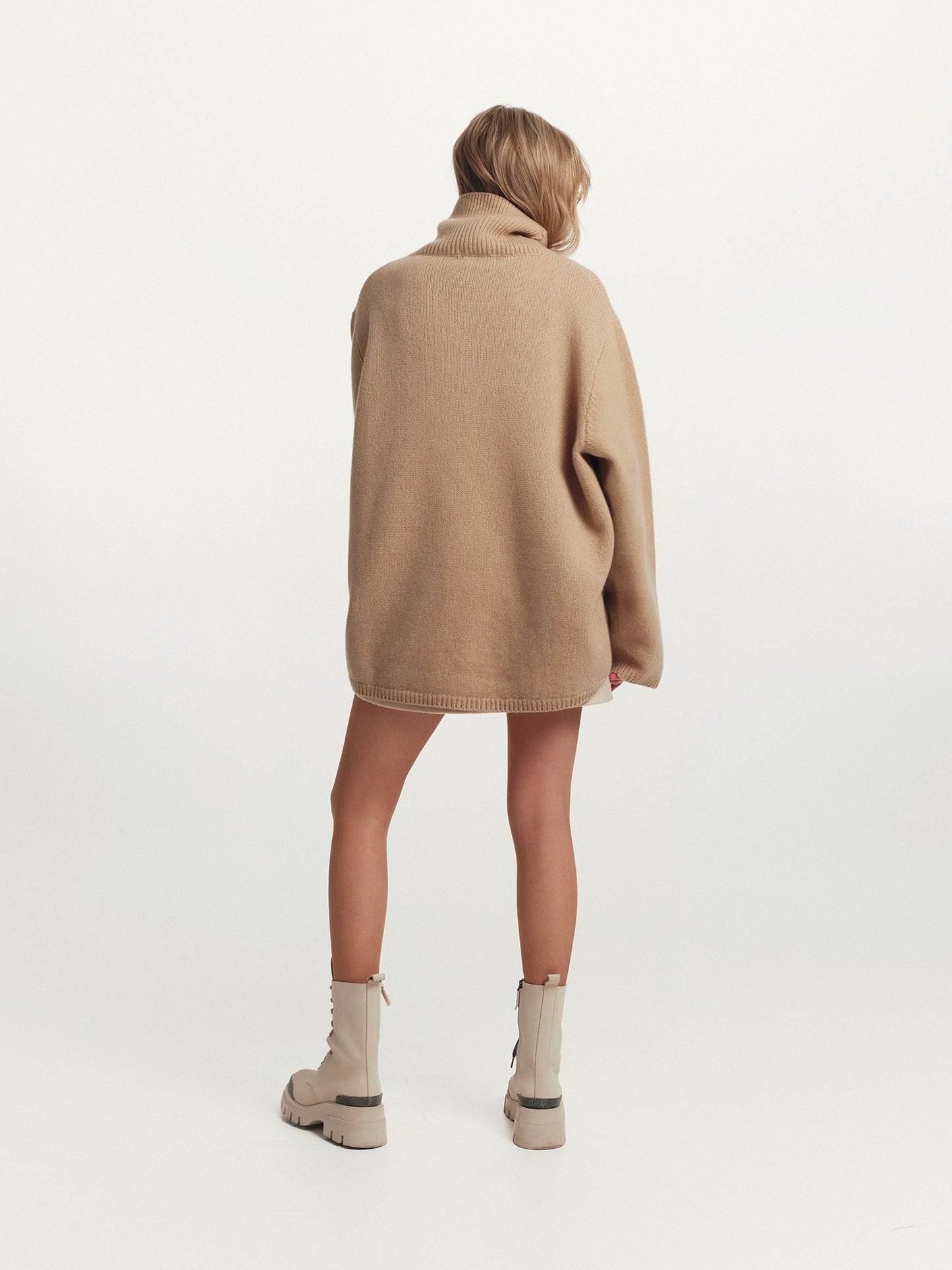 High-rise neckline oversized cashmere sweater in warm beige