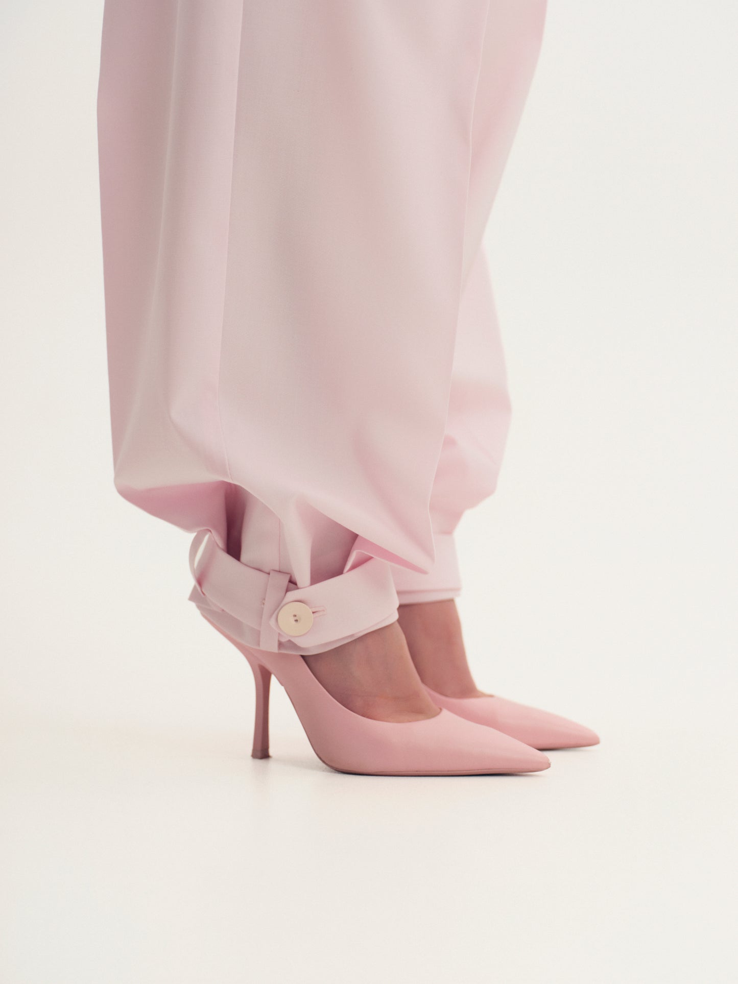 Wide-leg statement color wool pants with accent convertible hem