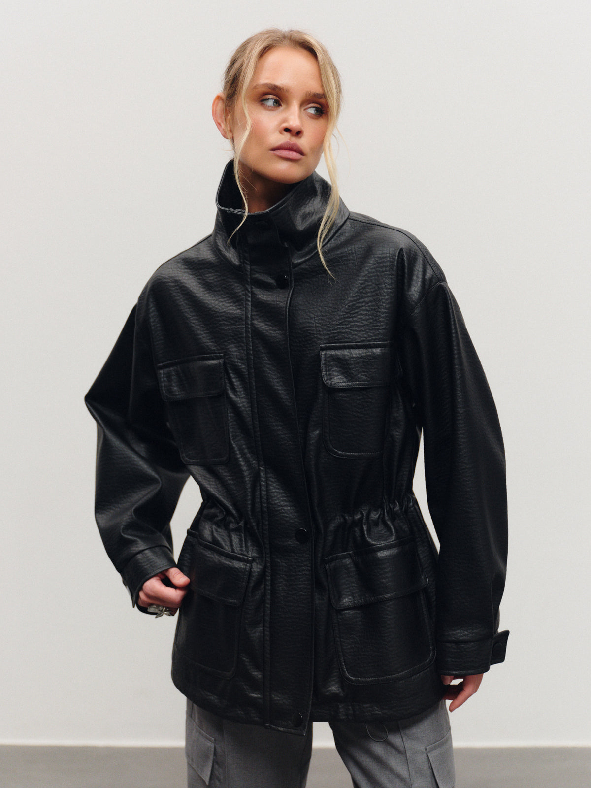 Trending eco-leather utility jacket with high-neck collar