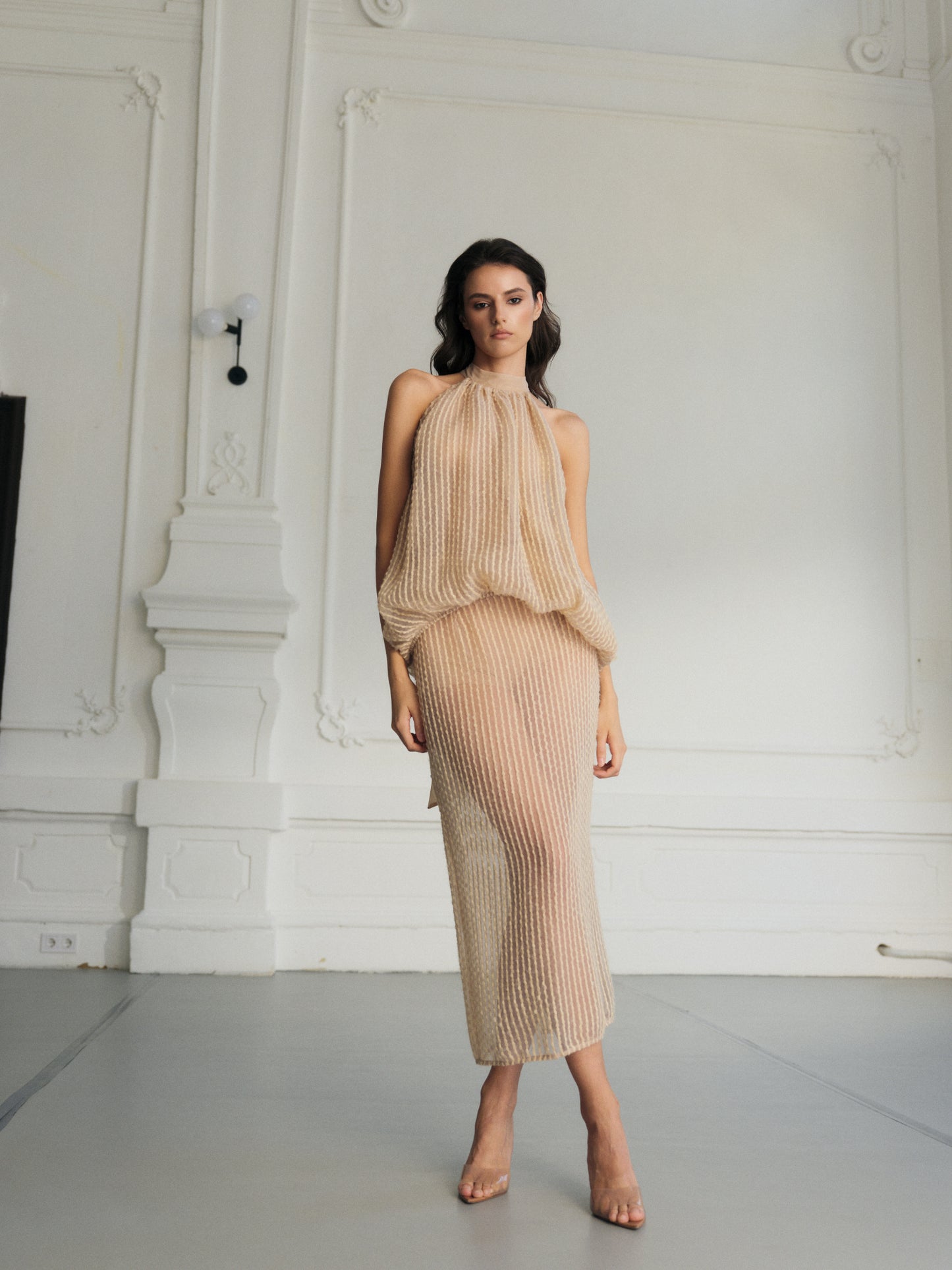 Two-piece open back volume halter top with  sheer skirt